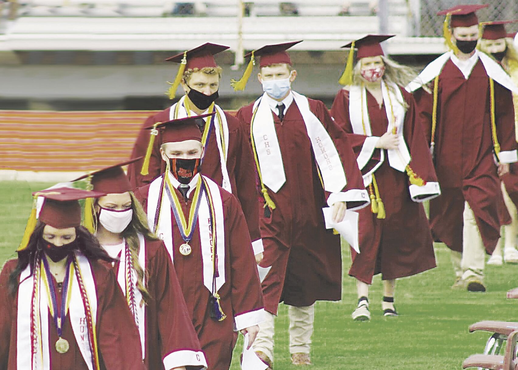 Alma mater, hail! — from six feet away, that is